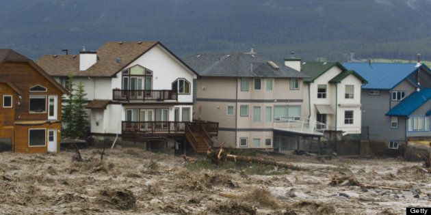 CANMORE, CANADA - JUNE 20: Houses damaged along the edge of Cougar Creek are shown June 20, 2013 in Canmore, Alberta, Canada. Widespread flooding caused by torrential rains washed out bridges and roads prompting the evacuation of thousnds. (Photo by John Gibson/Getty Images)