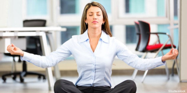 business woman doing yoga