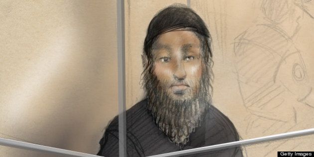 This courtroom sketch shows Raed Jaser appearing in court in Toronto on April 23, 2013. Two foreign nationals arrested on suspicion of what police say was an Al-Qaeda-backed plot to derail a Canadian passenger train in the Toronto area made their first court appearances Tuesday. Chiheb Esseghaier, 30, and Raed Jaser, 35, were arrested for allegedly planning to carry out an attack on a Via Rail train, the Royal Canadian Mounted Police told a news conference. The pair have been charged with conspiring to carry out an attack and conspiring with a terrorist group to murder persons, though very few details about the alleged plot have so far been revealed. AFP PHOTO/Alexandra NEWBOULD (Photo credit should read ALEXANDRA NEWBOULD/AFP/Getty Images)
