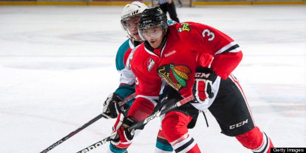 KELOWNA, CANADA - FEBRUARY 08: Seth Jones #3 of the Portland Winterhawks looks for the pass while checked by Colton Sissons #15 of the Kelowna Rockets on February 8, 2013 at Prospera Place in Kelowna, British Columbia, Canada. (Photo by Marissa Baecker/Getty Images)