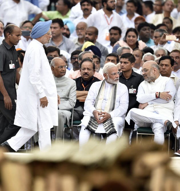 Former Prime Minister (standing), President Ramnath Kovind (Left), Prime Minister Narendra Modi (Middle)...