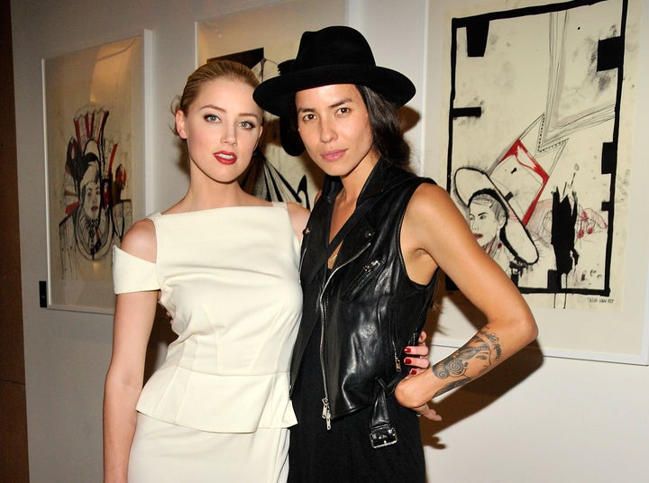 Amber Heard and then-girlfriend Tasya Van Ree, an artist and photographer, at Van Ree's "Distorted Delicacies" exhibit