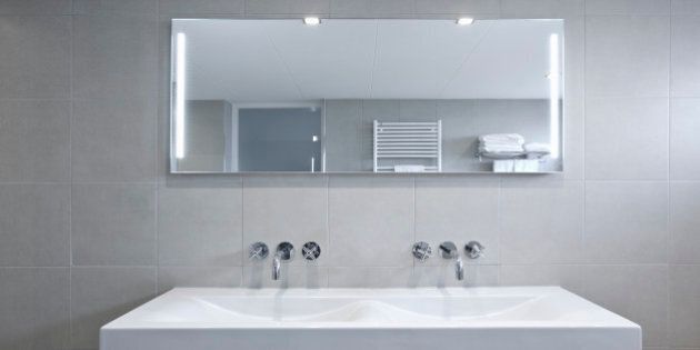 Sink and mirror in modern bathroom