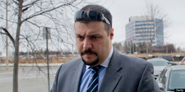 December 22, 2010-Cst. Babak Andalib-Goortani appears at SIU headquarters in Mississauga, he has been charged with beating a man during the G20 demonstrations. TORONTO STAR/TANNIS TOOHEY (Photo by Tannis Toohey/Toronto Star via Getty Images)