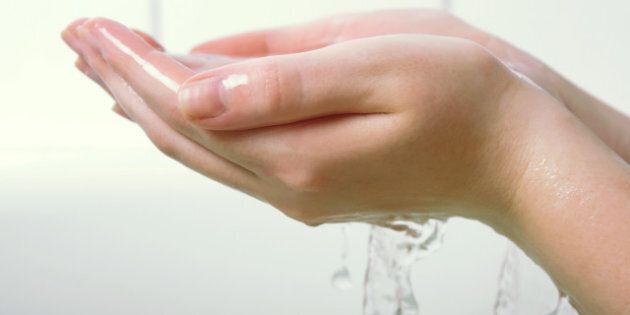 female hands closeup in bath