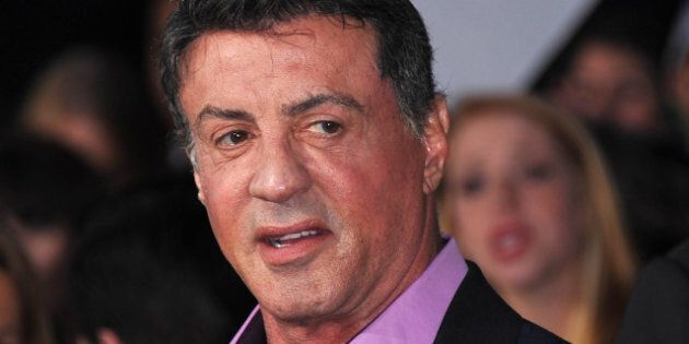 Sylvester Stallone arrives at the premiere of Lionsgate's 'The Hunger Games' at Nokia Theatre L.A. Live on March 12, 2012 in Los Angeles, California. AFP PHOTO/JOE KLAMAR (Photo credit should read JOE KLAMAR/AFP/Getty Images)
