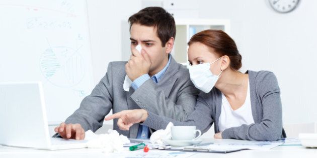 image of sick businessman with...