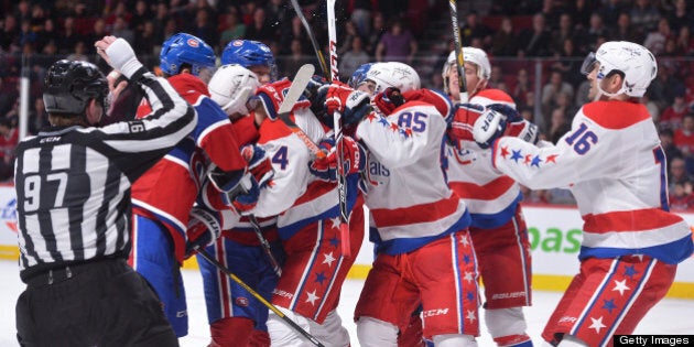 MONTREAL, CANADA - APRIL 20: Members of the Montreal Canadiens and the Washington Capitals get physical during the third period of the NHL game on April 20, 2013 at the Bell Centre in Montreal, Quebec, Canada. (Photo by Francois Lacasse/NHLI via Getty Images)