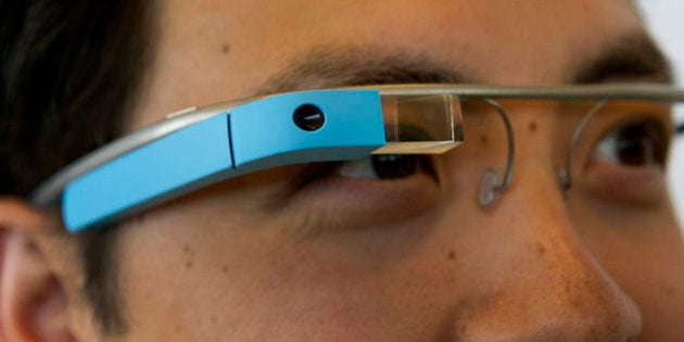 Google Inc employee Ray Liu, wears Project Glass internet glasses during a demonstration during at the Google I/O conference in San Francisco, California, U.S., on Wednesday, June 27, 2012. Google Inc. unveiled a $199 handheld computer called the Nexus 7 that features a 7-inch screen and is designed to help the company vie with Apple Inc., Microsoft Corp. and Amazon.com Inc. in the surging market for tablets. Photographer: David Paul Morris/Bloomberg via Getty Images