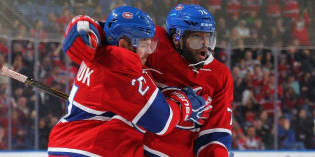BUFFALO, NY - FEBRUARY 12: Devante Smith-Pelly #21 of the Montreal Canadiens celebrates a second period goal against the Buffalo Sabres with teammate P.K. Subban #76 during an NHL game on February 12, 2016 at the First Niagara Center in Buffalo, New York. (Photo by Bill Wippert/NHLI via Getty Images)