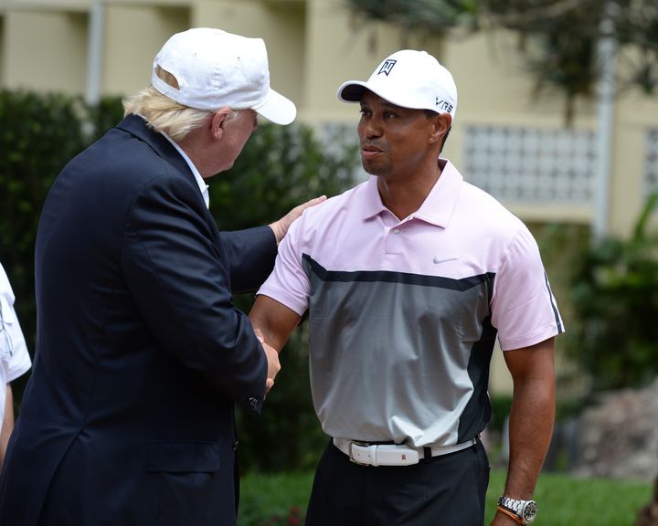 Donald Trump and Tiger Woods at the Tiger Woods Villa before the start of the World Golf Championships-Cadillac Championship at Trump National Doral on March 5, 2014, in Doral, Florida. Woods will be the fourth athlete to receive the Presidential Medal of Freedom from Trump.