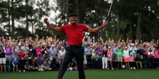 Tiger Woods réagit alors qu'il remporte le tournoi de golf Masters, le dimanche 14 avril 2019, à Augusta, en Géorgie.