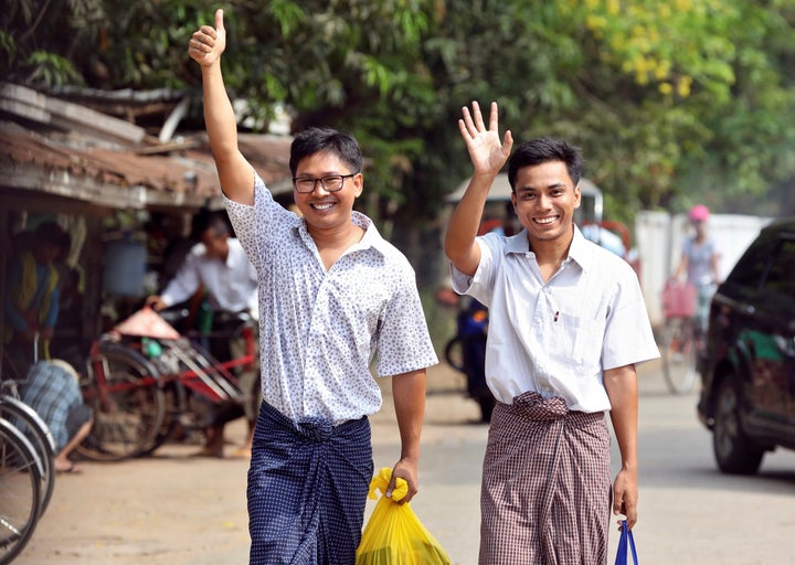 Reuters journalists Wa Lone and Kyaw Soe Oo walk free outside Insein prison after their release in Yangon, Myanmar, on Tuesday.