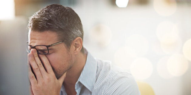 Cropped shot of a stressed businessman sitting at his deskhttp://195.154.178.81/DATA/i_collage/pi/shoots/783721.jpg