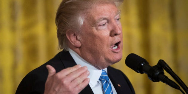 WASHINGTON, DC - FEBRUARY 15: President Donald Trump speaks to Israeli Prime Minister Benjamin Netanyahu during a joint press conference in the East Room of the White House in Washington, DC on Wednesday, Feb. 15, 2017. (Photo by Jabin Botsford/The Washington Post via Getty Images)