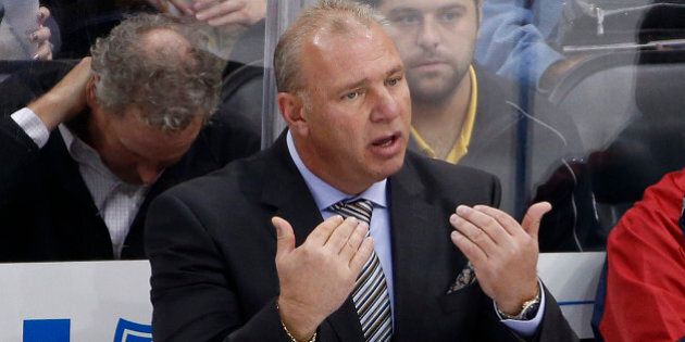 Montreal Canadiens head coach Michel Therrien calls for an official during an NHL hockey game against the Pittsburgh Penguins in Pittsburgh Tuesday, Oct. 13, 2015.(AP Photo/Gene J. Puskar