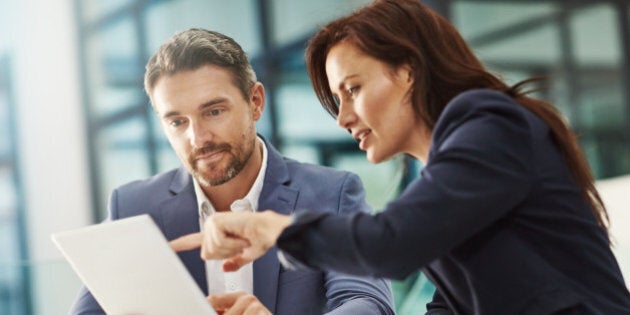 Cropped shot of two businesspeople meeting in the office