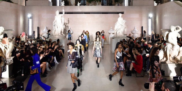 PARIS, FRANCE - MARCH 07: A wide shot of models walking the runway during the finale of the Louis Vuitton...
