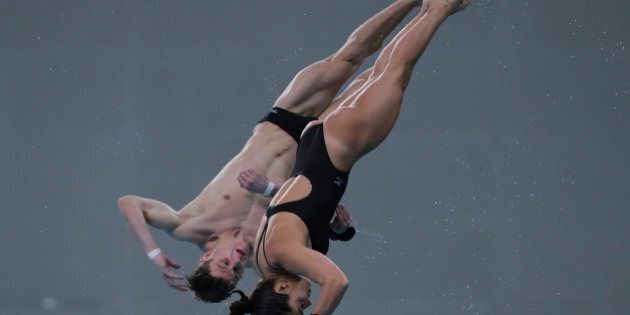BEIJING, CHINA - MARCH 05: Meaghan Benfeito and Vincent Riendeau of Canada compete in the Mixed 10m Synchro Platform final on day three of the FINA/NVC Diving World Series 2017 Beijing Station at the National aquatics center-Water Cube on March 5, 2017 in Beijing, China. (Photo by Lintao Zhang/Getty Images)