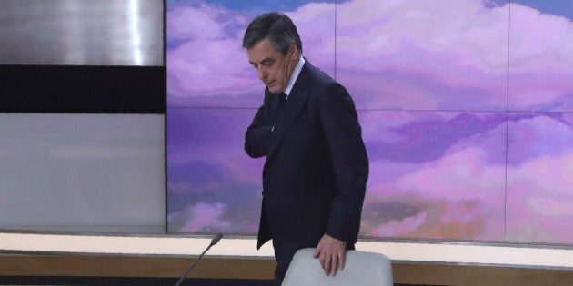 French presidential election candidate for the right-wing Les Republicains (LR) party Francois Fillon arrives to take part in a broadcast interview, on March 5, 2017 at a set of French TV group France 2 in Paris. / AFP PHOTO / Jacques DEMARTHON (Photo credit should read JACQUES DEMARTHON/AFP/Getty Images)