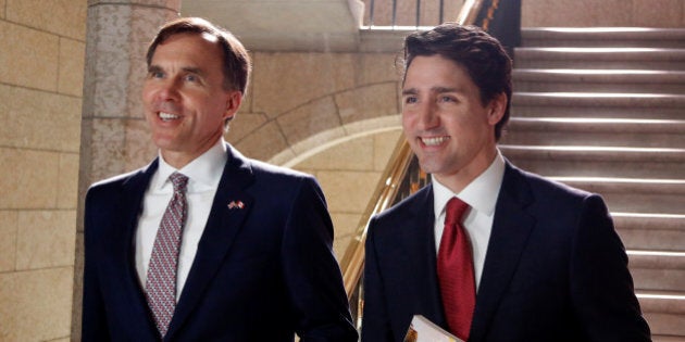 Canada's Prime Minister Justin Trudeau (R) and Finance Minister Bill Morneau walk to the House of Commons to deliver the budget on Parliament Hill in Ottawa, Canada March 22, 2017. REUTERS/Patrick Doyle