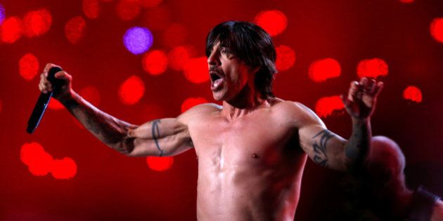 Anthony Kiedis of The Red Hot Chili Peppers performs during the halftime show of the NFL Super Bowl XLVIII football game between the Denver Broncos and the Seattle Seahawks in East Rutherford, New Jersey, February 2, 2014. REUTERS/Shannon Stapleton/File Photo