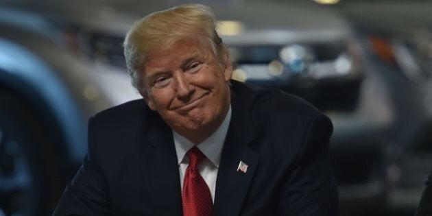 US President Donald Trump speaks with auto executives at American Center for Mobility in Ypsilanti, Michigan on March 15, 2017. / AFP PHOTO / Nicholas Kamm (Photo credit should read NICHOLAS KAMM/AFP/Getty Images)