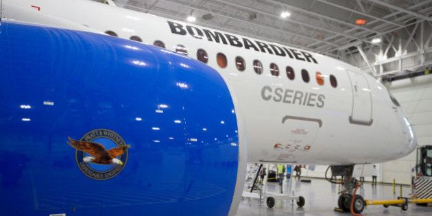 Bombardier's CS300 Aircraft, showing its Pratt & Whitney engine in the foreground, sits in the hangar prior to its test flight in Mirabel February 27, 2015. Bombardier Inc won a multibillion dollar order for its CSeries passenger jets from Delta Air Lines on April 28, 2016, enhancing the new planes' credibility in international markets and boosting prospects for the loss-making company to return to profitability. REUTERS/Christinne Muschi/File Photo