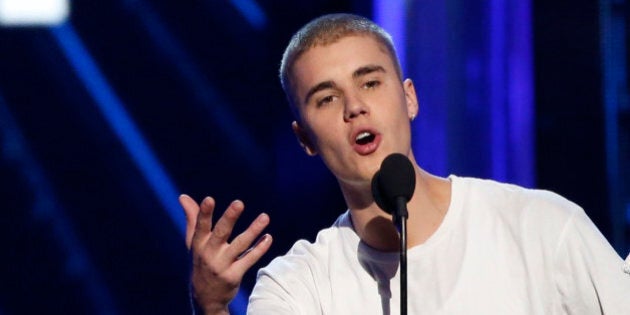 Justin Bieber accepts the award for Top Male Artist at the 2016 Billboard Awards in Las Vegas, Nevada, U.S., May 22, 2016. REUTERS/Mario Anzuoni