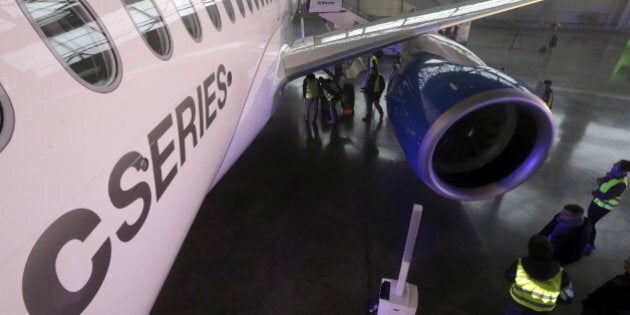 Latvia's national airline AirBaltic, a launch partner, and Canada's Bombardier present a new CS100 aircraft in Riga international airport, Latvia, November 27, 2015. REUTERS/Ints Kalnins