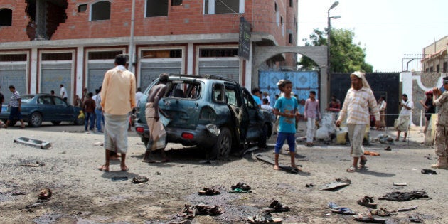 People check the site of a suicide bombing in the southern port city of Aden, Yemen, May 23, 2016. REUTERS/Fawaz Salman TPX IMAGES OF THE DAY