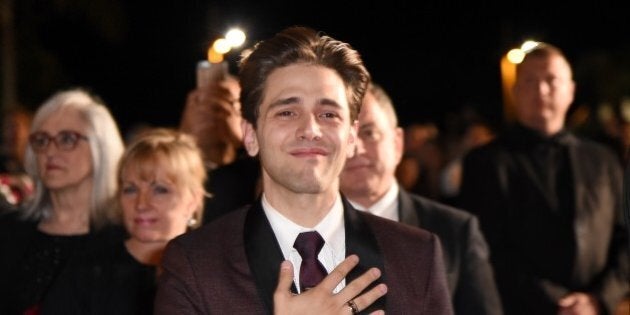 Canadian director Xavier Dolan leaves on May 19, 2016 following the screening of the film 'It's Only The End Of The World (Juste La Fin Du Monde)' at the 69th Cannes Film Festival in Cannes, southern France. / AFP / ANNE-CHRISTINE POUJOULAT (Photo credit should read ANNE-CHRISTINE POUJOULAT/AFP/Getty Images)