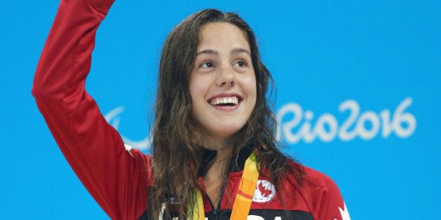 RIO DE JANEIRO, BRAZIL - SEPTEMBER 11: Silver medalist Aurelie Rivard of Canada celebrates on the podium at the medal ceremony for Women's 200m Individual Medley - SM10 on day 4 of the Rio 2016 Paralympic Games at the Olympic Aquatic Stadium on September 11, 2016 in Rio de Janeiro, Brazil. (Photo by Buda Mendes/Getty Images)