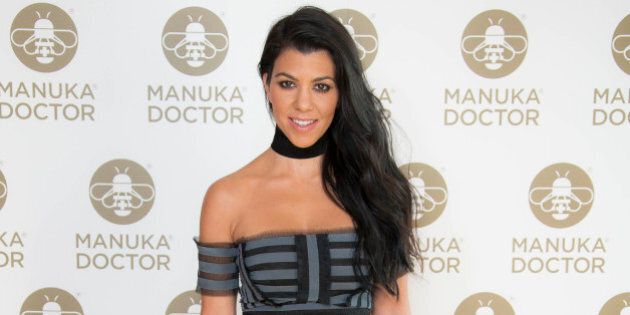 Kourtney Kardashian poses for photographers at a photo call for the launch of Manuka Doctor at the Edition hotel in central London, Wednesday, June 8, 2016. (Photo by Joel Ryan/Invision/AP)