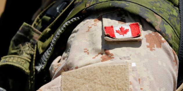 A Canadian soldier from the Royal 22nd Regiment wears a Maple Leaf flag on his uniform during a non-combative extraction operation as part of Rim of the Pacific (RIMPAC) 2016 exercise held at Camp Pendleton, California United States, July 11, 2016. REUTERS/Mike Blake
