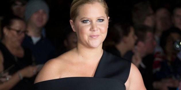 Comedian Amy Schumer poses for photographers upon arrival at the GQ magazine Awards at the Tate Modern in London, Tuesday, Sept. 6, 2016. (Photo by Joel Ryan/Invision/AP)