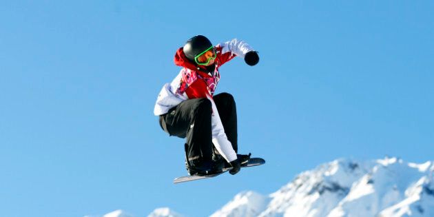 Canada's Mark McMorris performs a jump during the men's snowboard slopestyle competition at the 2014 Sochi Olympic Games in Rosa Khutor February 8, 2014. REUTERS/Lucas Jackson (RUSSIA - Tags: SPORT OLYMPICS SNOWBOARDING)