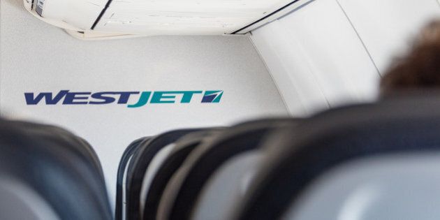 TORONTO, ONTARIO, CANADA - 2015/09/26: Interior of a Westjet plane. WestJet Airlines Ltd. is a Canadian low-cost carrier that provides scheduled and charter air service to 100 destinations in Canada. (Photo by Roberto Machado Noa/LightRocket via Getty Images)