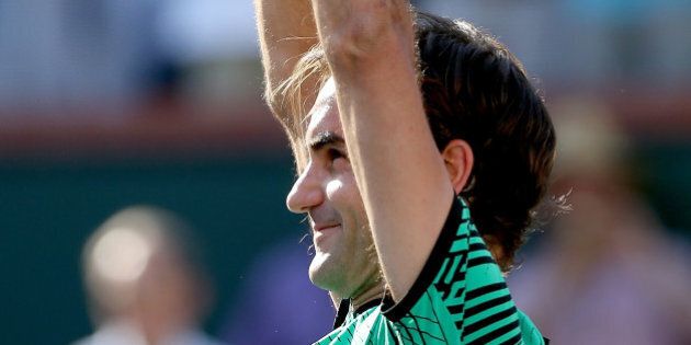 INDIAN WELLS, CA - MARCH 19: Roger Federer of Switzerland celebrates his win over Stan Wawrinka of Switzerland during the men's final of the BNP Paribas Open at the Indian Wells Tennis Garden on March 19, 2017 in Indian Wells, California. (Photo by Matthew Stockman/Getty Images)