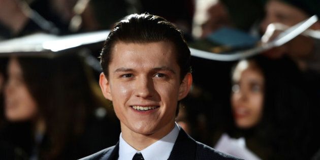 Actor Tom Holland poses at the premiere of the film
