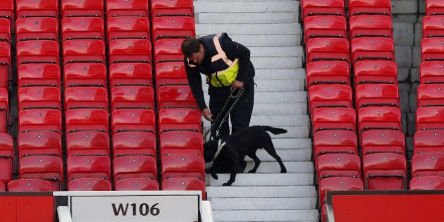 Britain Soccer Football - Manchester United v AFC Bournemouth - Barclays Premier League - Old Trafford - 15/5/16A police dog after the match was abandonedReuters / Andrew YatesLivepicEDITORIAL USE ONLY. No use with unauthorized audio, video, data, fixture lists, club/league logos or