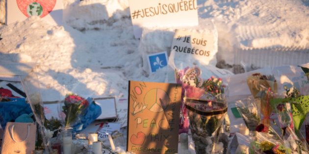 Messages and flowers are placed near a mosque that was the location of a shooting spree in Quebec City, Quebec on January 31, 2017.Alexandre Bissonnette cut a low profile as a shy, withdrawn political science student, keen on far-right ideas. The Canadian political science student known to have nationalist sympathies was charged January 30, 2017 with six counts of murder over a shooting spree at a Quebec mosque -- one of the worst attacks ever to target Muslims in a western country.Prime Minister Justin Trudeau condemned as a 'terrorist attack' Sunday night's assault on the Islamic Cultural Center in a busy district of Quebec City, which sent terrified worshippers fleeing barefoot in the snow. / AFP / Alice Chiche (Photo credit should read ALICE CHICHE/AFP/Getty Images)