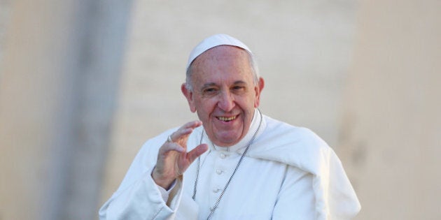 Pope Francis waves as he arrives to lead his Wednesday general audience in Saint Peter's square at the Vatican, March 29, 2017. REUTERS/Tony Gentile