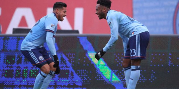 NEW YORK, NEW YORK - March 18: Rodney Wallace, (right), #23 of New York City FC celebrates with team mates Ronald Matarrita #22 of New York City FC after scoring during the New York City FC Vs Montreal Impact regular season MLS game at Yankee Stadium on March 18, 2017 in New York City. (Photo by Tim Clayton/Corbis via Getty Images)