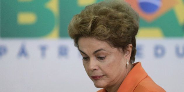 Brazil's President Dilma Rousseff arrives for a ceremony in Planalto presidential palace to launch an agricultural plan that allocates billions of dollars to farmers in Braslia, Brazil, Wednesday, May 4, 2016. Brazilâs attorney general has asked the countryâs highest court to authorize an investigation into embattled Rousseff over obstruction of justice allegations, according to major Brazilian news organizations. (AP Photo/Eraldo Peres)