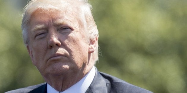 US President Donald Trump attends the 36th Annual National Peace Officers Memorial Service at the US Capitol in Washington, DC, May 15, 2017. / AFP PHOTO / SAUL LOEB (Photo credit should read SAUL LOEB/AFP/Getty Images)