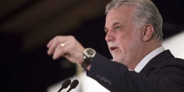 Quebec Liberal leader, Philippe Couillard(C), addresses the Board of Trade of Metropolitan Montreal April 1, 2014 in Montreal, Canada. The elections are scheduled for April 7, 2014. AFP PHOTO/Francois Laplante Delagrave (Photo credit should read Francois Laplante Delagrave/AFP/Getty Images)