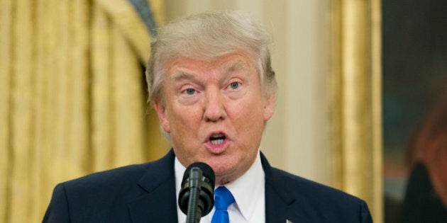 WASHINGTON, DC - FEBRUARY 1: (AFP OUT) U.S. President Donald Trump speaks before Rex Tillerson was sworn in as 69th secretary of state in the Oval Office of the White House on February 1, 2017 in Washington, DC. Tillerson was confirmed by the Senate earlier in the day in a 56-43 vote. (Photo by Michael Reynolds-Pool/Getty Images)