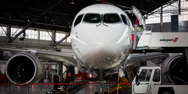 A picture taken at the Zurich Airport in Zurich on July 6, 2016 shows the Swiss International Air Lines' new Bombardier CS 100 passenger jetliner during a media presentation. Swiss International Air Lines' new Bombardier CS 100 jetliner is the first rolled out aircraft of the Canadian Bombardier Commercial Aircraft's new jetliner C-Series aircrafts. / AFP / MICHAEL BUHOLZER (Photo credit should read MICHAEL BUHOLZER/AFP/Getty Images)