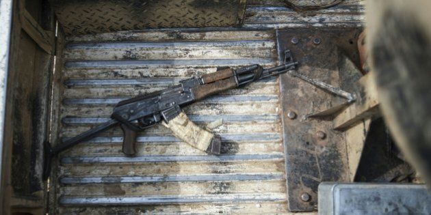 An AK47 machine gun in the back of a military vehicle in Mbalala, Borno State northeast Nigeria on March 25, 2016. On April 14, 2014, Boko Haram militants kidnapped 276 schoolgirls from their dormitories at the Government Girls Secondary School Chibok, drawing global attention to the Islamist insurgency in northeast Nigeria. / AFP / STEFAN HEUNIS (Photo credit should read STEFAN HEUNIS/AFP/Getty Images)